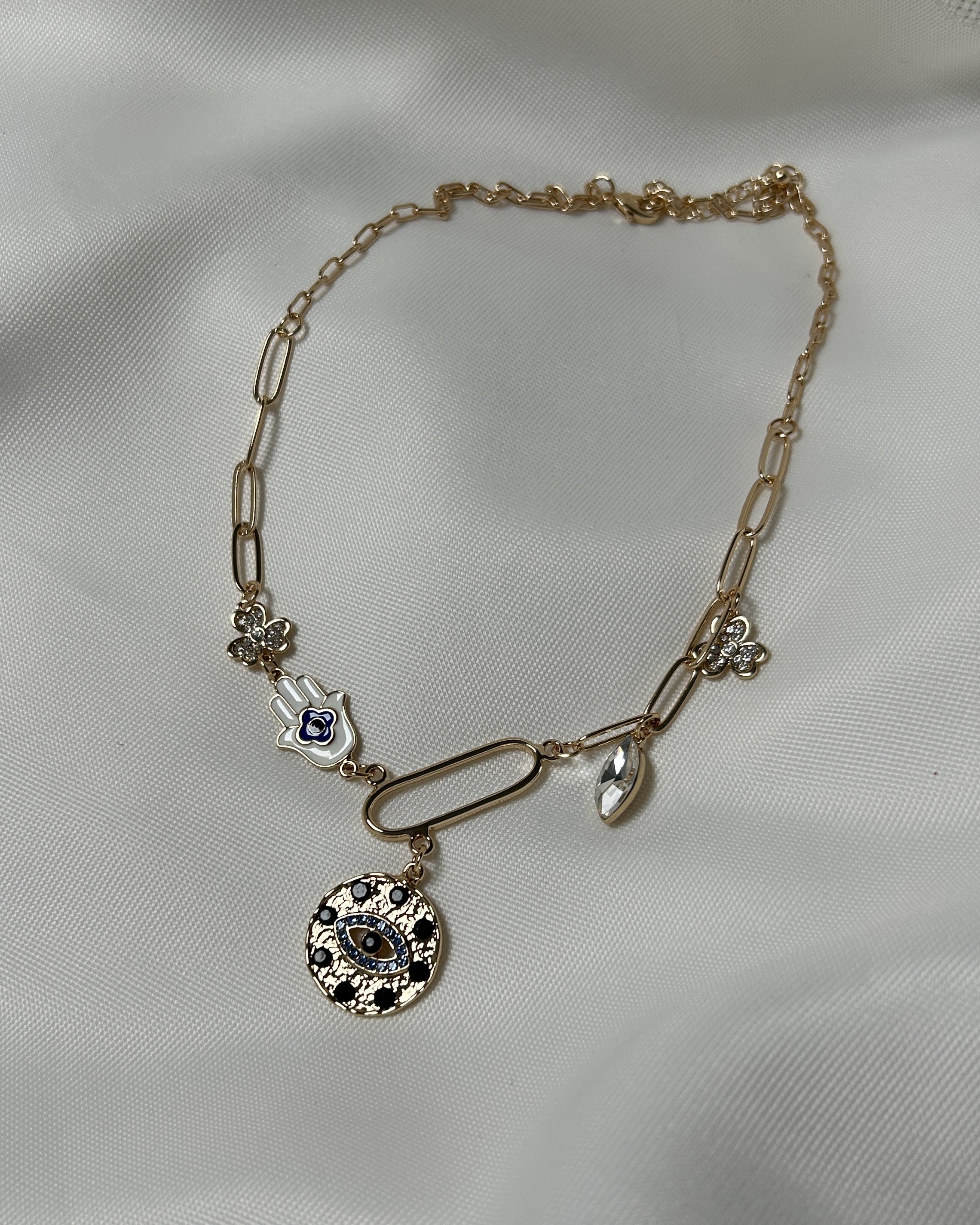 Nazar Boncuklu ve El Figürlü Altın Renk Çoklu Charm Çelik Kolye