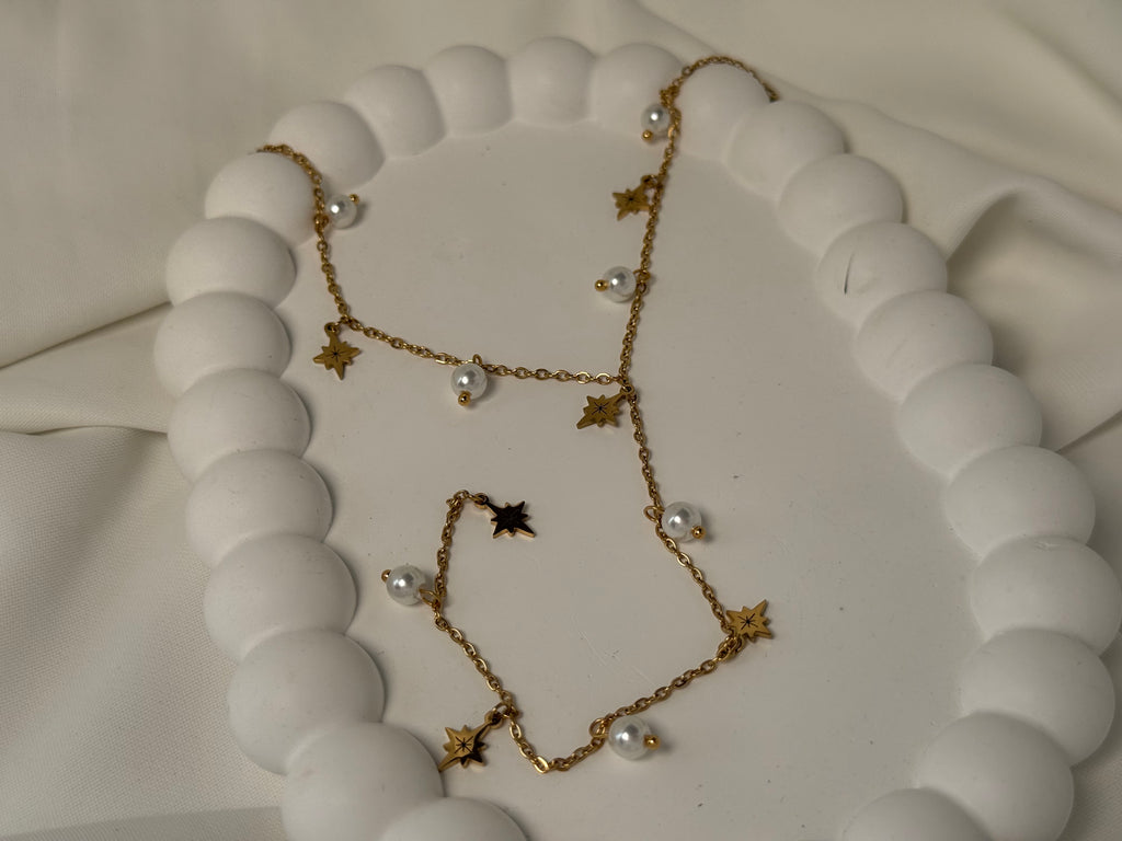 Kuzey Yıldızı ve İncili Sallantılı Çelik Y Kolye