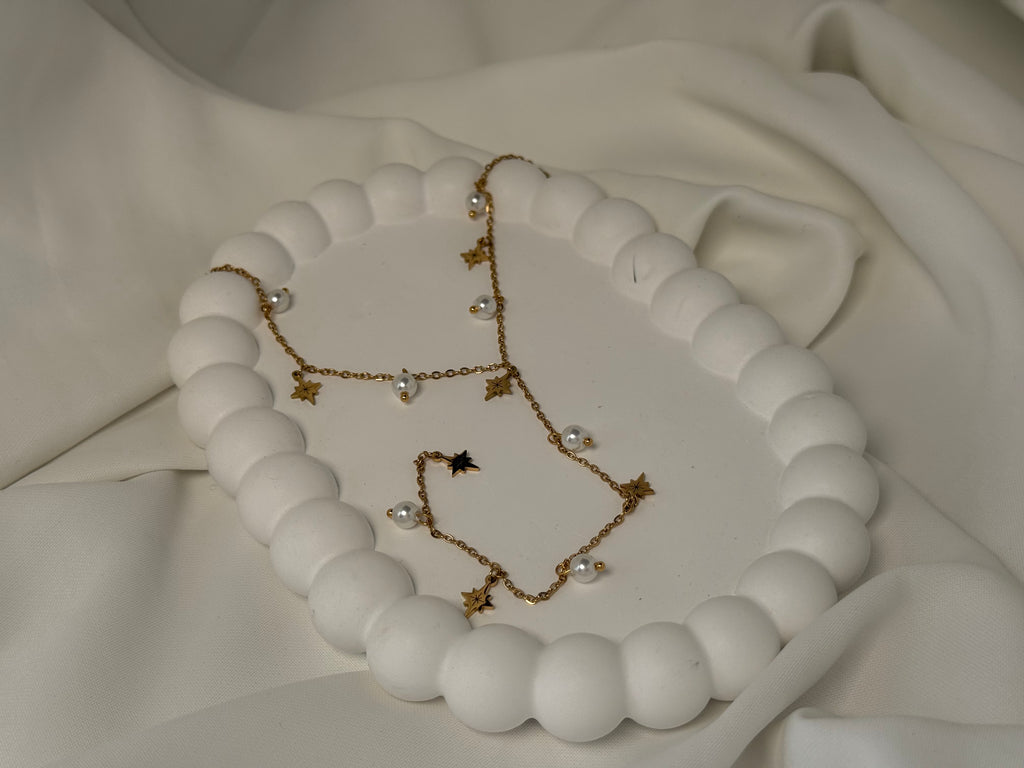 Kuzey Yıldızı ve İncili Sallantılı Çelik Y Kolye