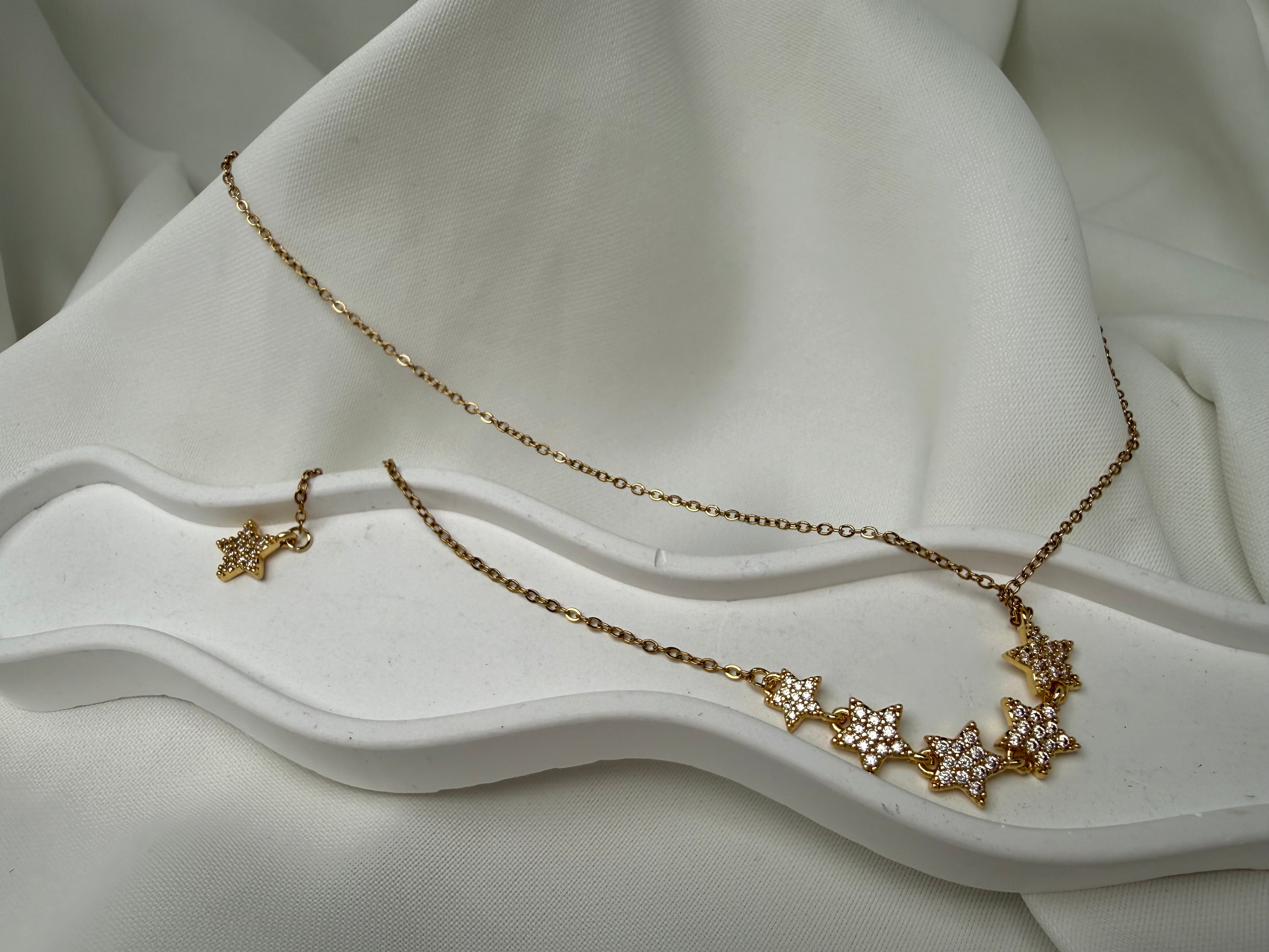 Taşlı Yıldız ve Sallantılı Yıldızlı Çelik Y Kolye