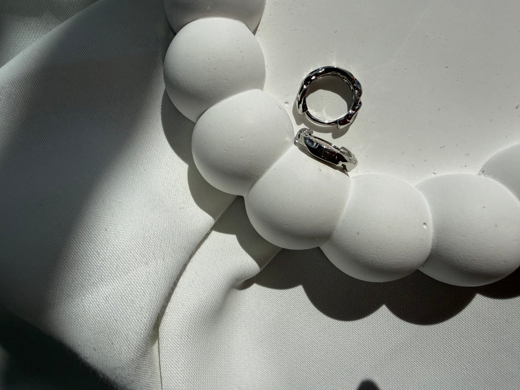 Şık Burgu Halka Çelik Küpe