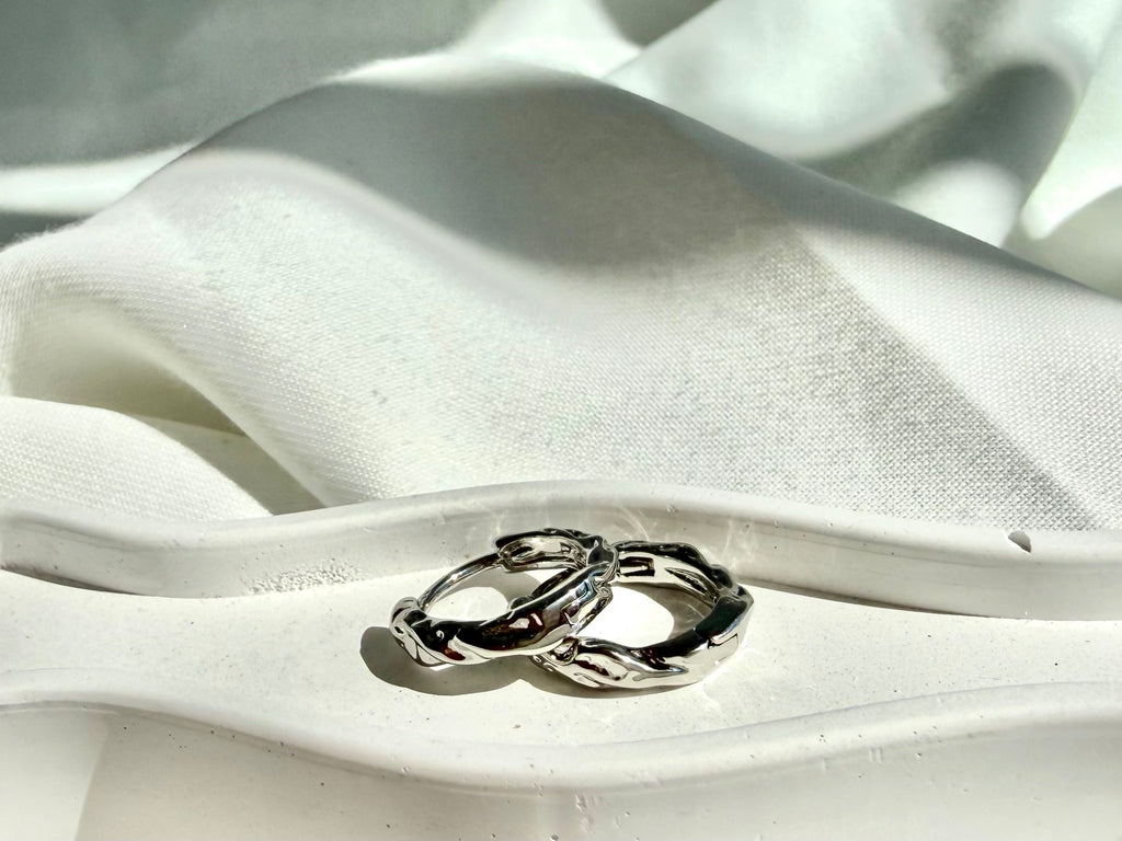 Şık Burgu Halka Çelik Küpe